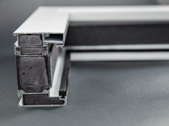 Cross-section of a window profile with a fire protection foam filling