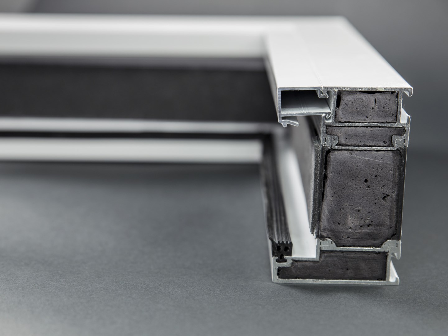 Cross-section of a window profile with a fire protection foam filling